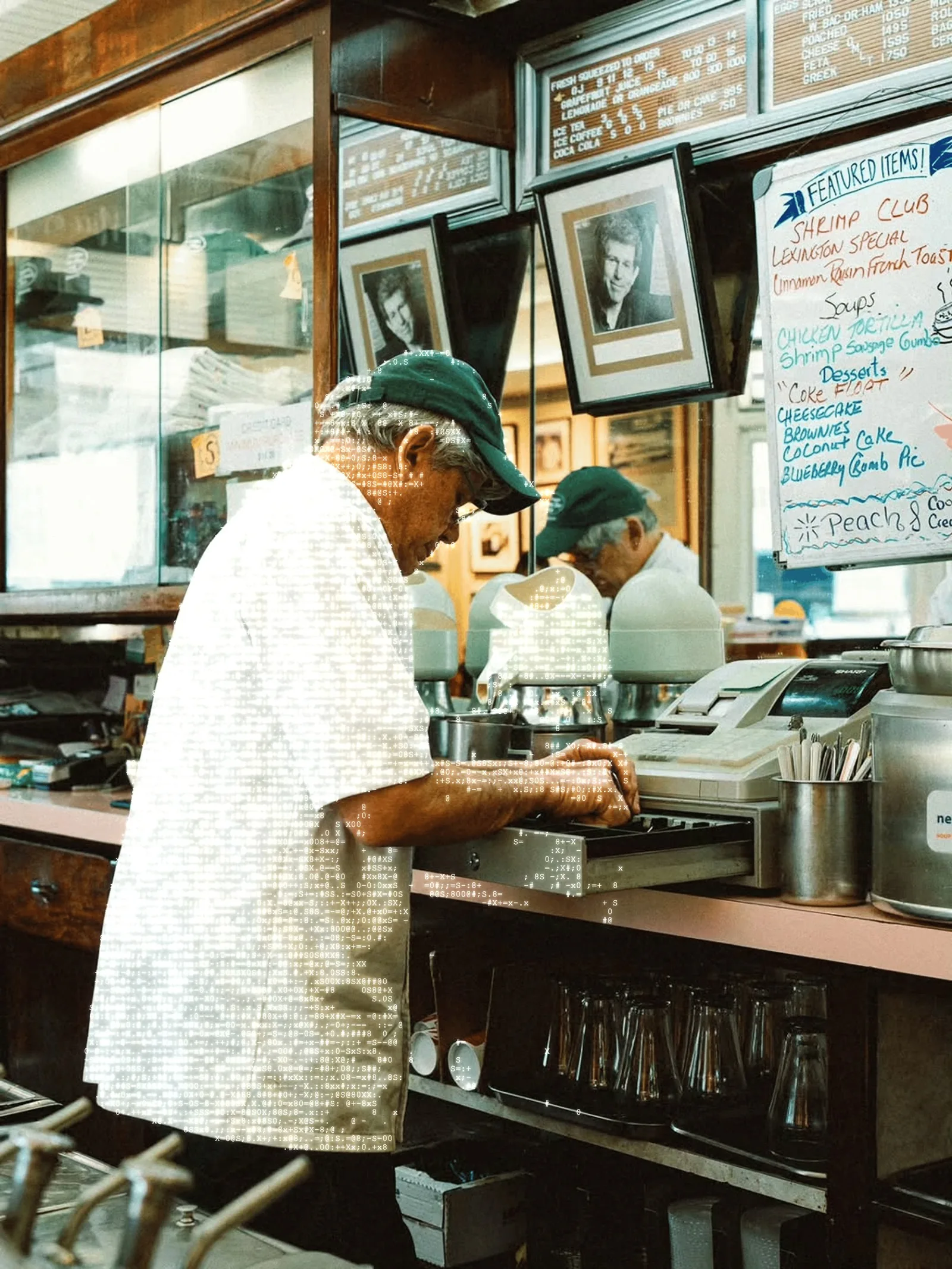A restaurant worker rings up an order at the register