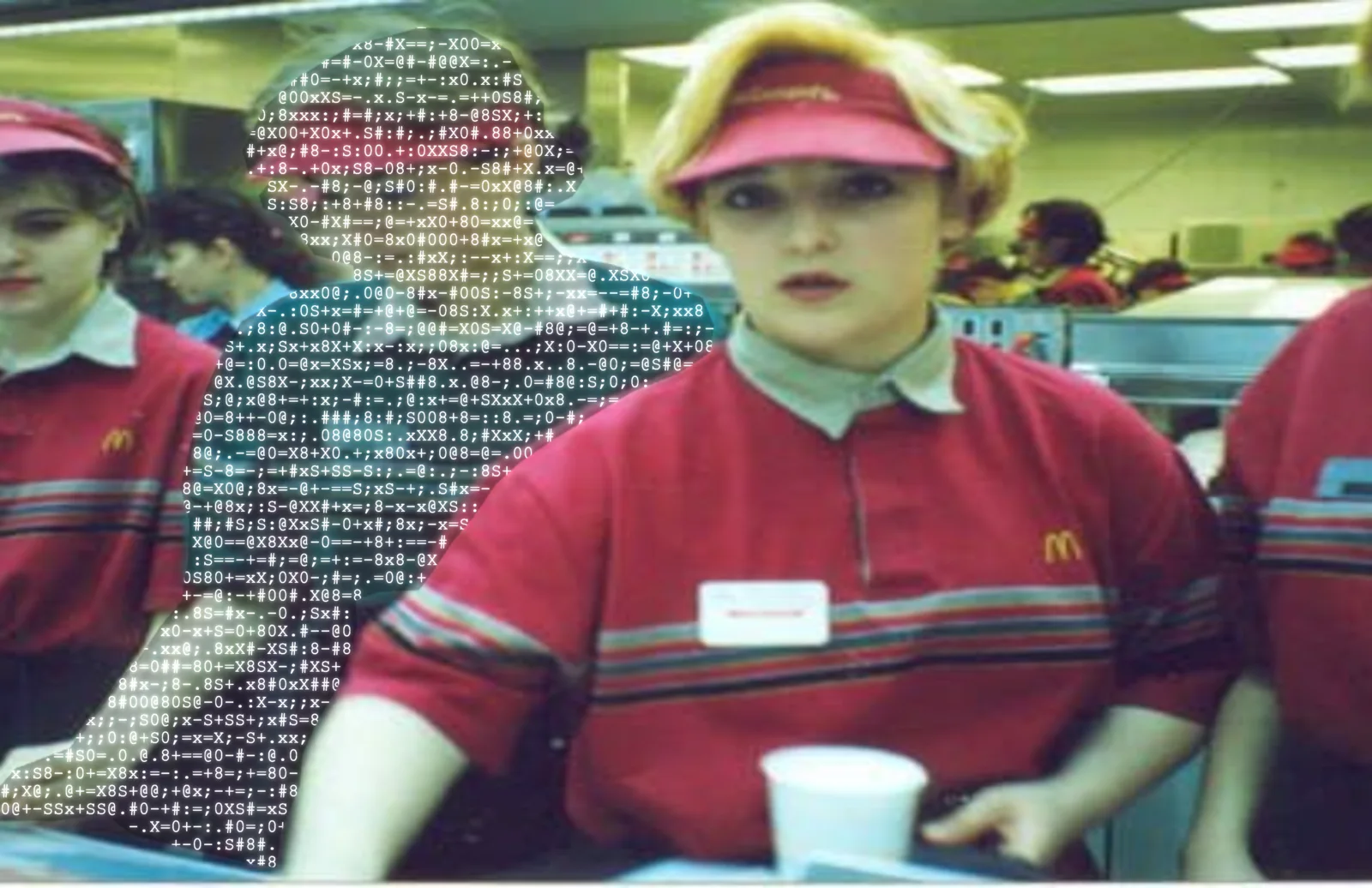 A restaurant manager working among the team during service